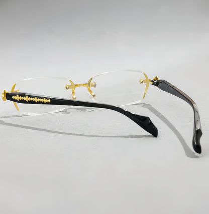 Iz Refined Elegance: Vintage-Inspired Rimless Eyewear Frame with minimalist Gold Design.